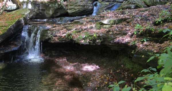 Water flowing over a rock shelf